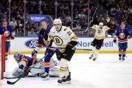 Bruins rookie scores twice, Jeremy Swayman dominates to beat Islanders