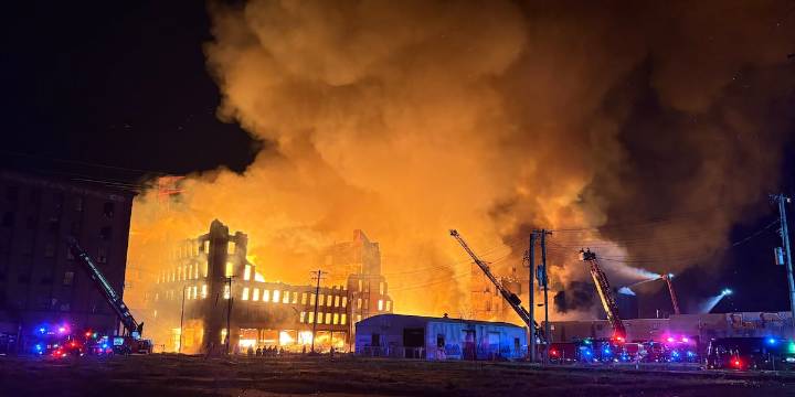 Firefighters battle flames at 3 connected warehouses downtown