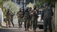 Israeli soldiers appear to kill Palestinian men in West Bank after they surrender