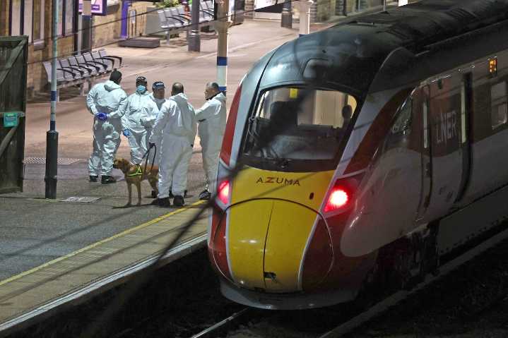 Police rule out terrorism in stabbing attack on UK train after 2 men are arrested