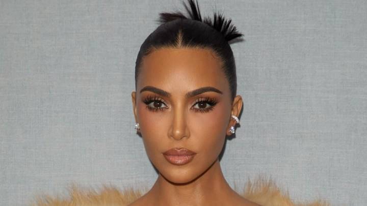 Kim Kardashian puts an autumn spin on the 'naked dress' in backless crochet look
