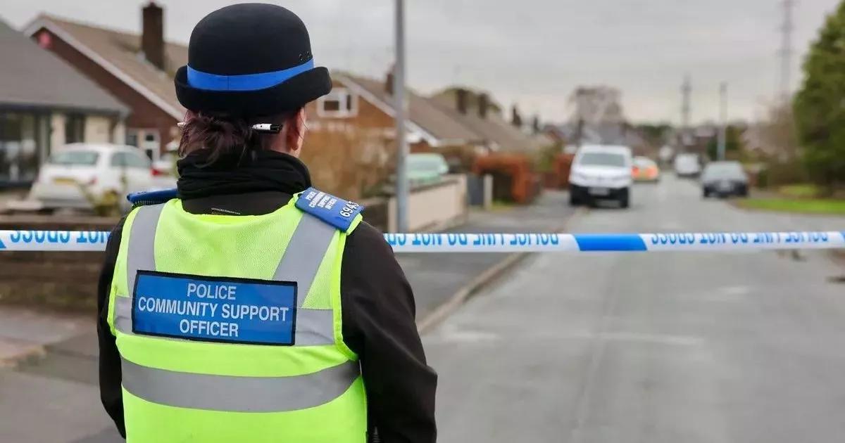 'Murder' probe as man found dead in quiet cul de sac and boy among five arrested