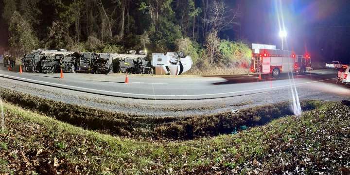 Two injured in crash involving car and overturned tractor trailer