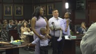 Siblings reunited as 18 children finalize adoptions at Duval County Courthouse