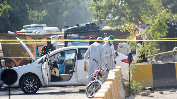 Suicide bomber attacks outside Islamabad court, killing 12, says Pakistan’s interior minister