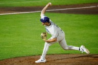 Twins trade for pitcher, add six to 40