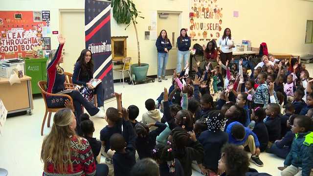 Patriots cheerleaders promote reading at Boston school