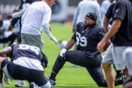 Raiders defensive tackle Adam Butler gardens in Texas in NFL offseason