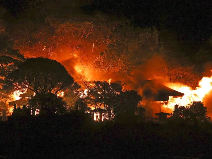 A fire in southwestern Japan damages 170 homes and forces evacuations