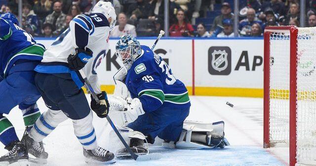 Morrissey's three points power Winnipeg Jets to 5-3 victory over Vancouver Canucks