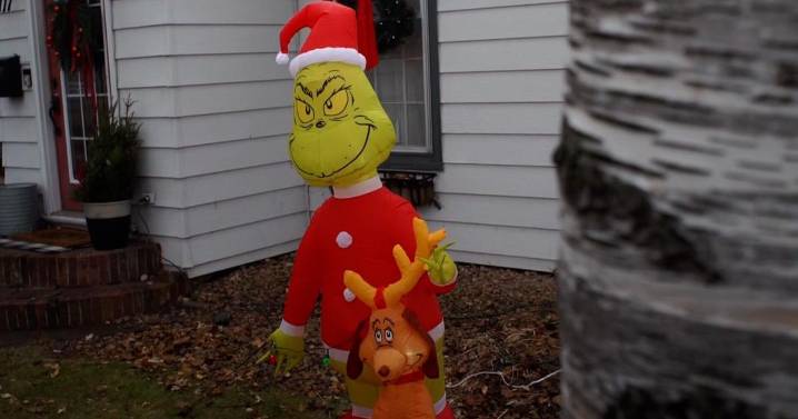 Osseo police pitch in to help family after teens steal Grinch inflatable from their yard