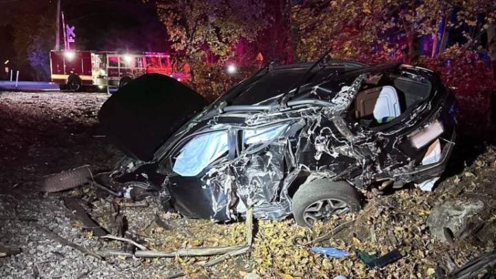 Commuter train plows through car on tracks in Acton