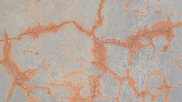 7 Possible Reasons Your Concrete Driveway Is Covered In Rust Stains (& How To Remove Them)