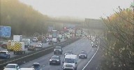 Long delays after three-car crash on M60