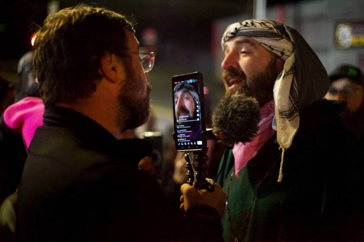 Livestreamers are filming — and sometimes creating — conflict at Portland ICE protests for clicks and cash