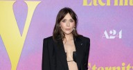Elizabeth Olsen's No Shirt Suit Is a Polished Way to Do Office Siren