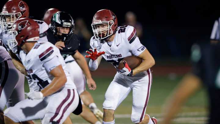 Football roundup: DeWitt, Portland blank opponents for district titles