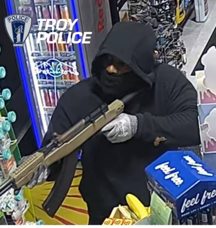 Armed thief who robbed Troy gas station still at