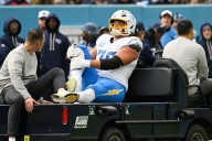 Chargers’ Joe Alt carted off field with ankle injury against Titans