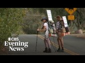 Couple walking through every U.S. state aims to find common ground among Americans