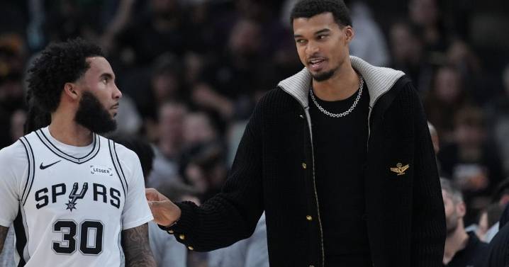 San Antonio's Victor Wembanyama to miss at least 2-3 weeks with strained calf, AP source says