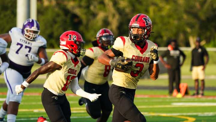 Why is Cardinal Mooney football the favorite in Region 3