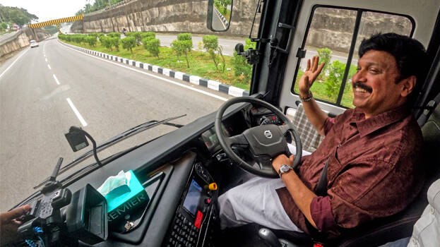 K.B. Ganeshkumar as driver: New Volvo for KSRTC; most equipped bus available in India, says Minister