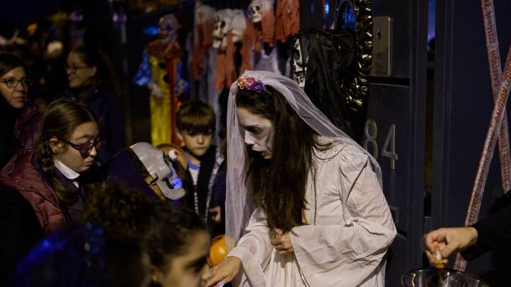 Halloween and a declining Christian tradition coexist on All Saints' Day in Spain