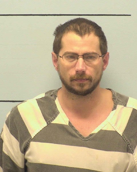 Man turns himself in, accused of stabbing woman in chest