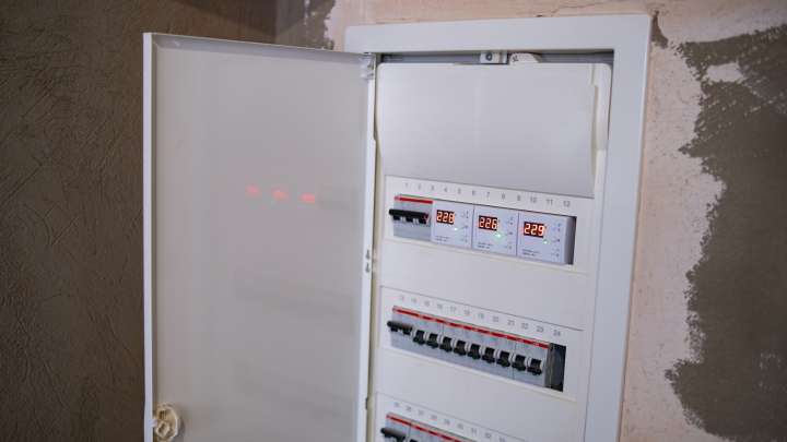 Hide The Eyesore Of An Ugly Breaker Box With One Sleek And Simple DIY Solution