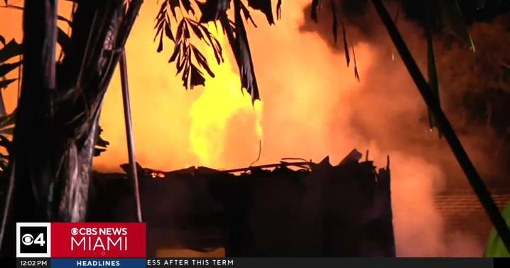 Miami Heat coach Erik Spoelstra seen outside as massive fire engulfed his mansion