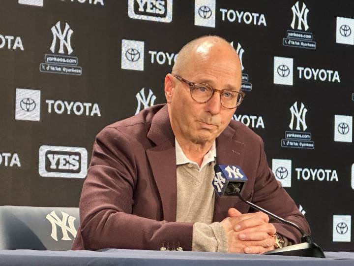 Yankees' Brian Cashman absent from GM Meetings, will speak remotely