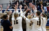 Photo gallery of a D1 district volleyball final between Clarkston and Oxford