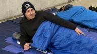 Yanks GM Cashman sleeping on 'cold concrete' to support homeless youth