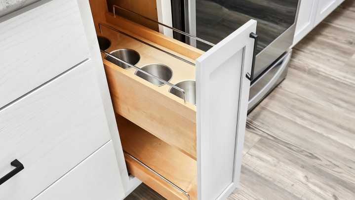 Why You Should Install A Vertical Drawer Beside Your Stove