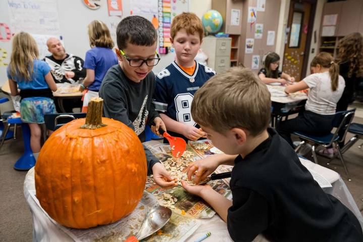 Mars Elementary chuck pumpkins for Halloween