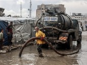 Displaced Palestinian families suffer as heavy rains flood Gaza tent camps
