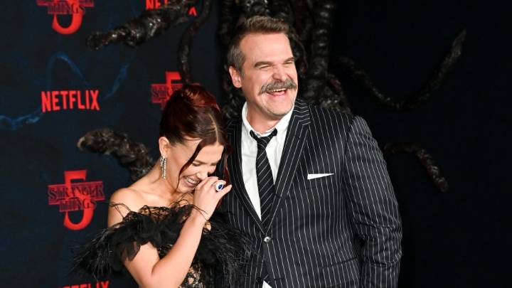 Millie Bobby Brown & David Harbour Hug On 'Stranger Things' Red Carpe