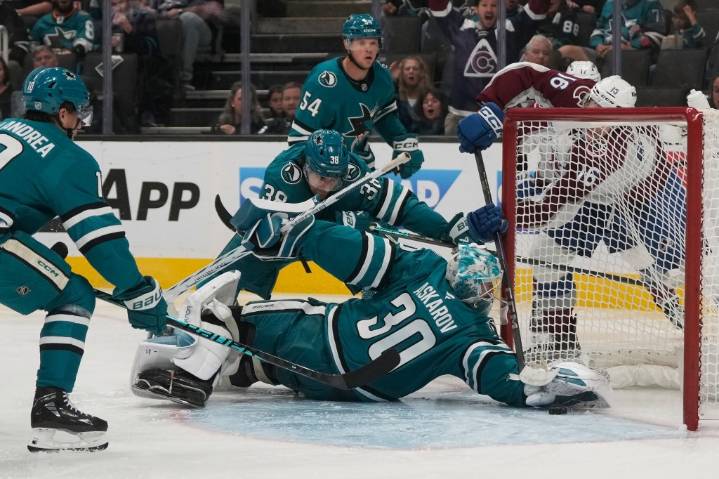 Sharks beat Avalanche in OT, lose defenseman to injury