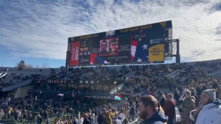 Crowd shares moment of silence for shot National Guardsmen at WVU game