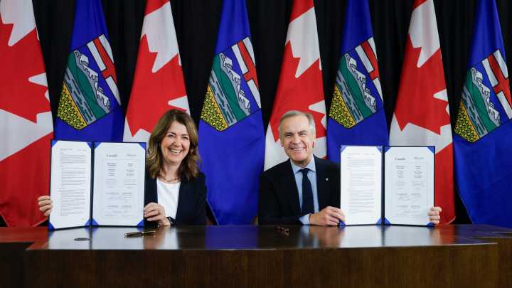 Canada's prime minister and Alberta's premier sign pipeline deal which could reverse oil tanker ban