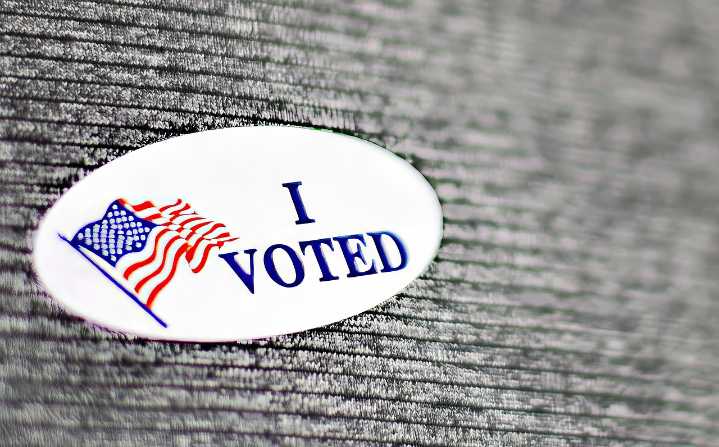 Voters enshrine voting restrictions, bail limits in state constitutions