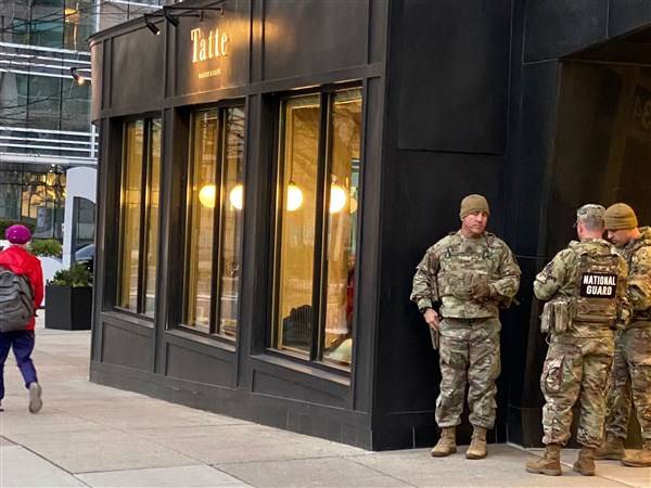 Bustling D.C. retail district in shock after shooting of National Guard members