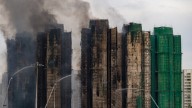3 arrested, at least 65 dead as Hong Kong towers continue to burn