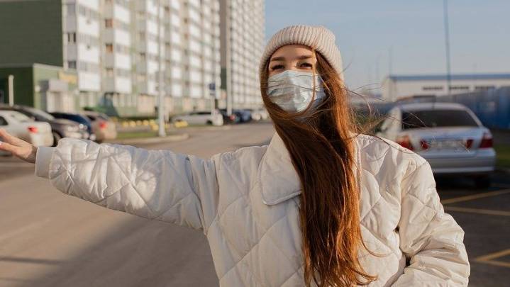 Local Woman Wears Face Mask Just to Keep Warm