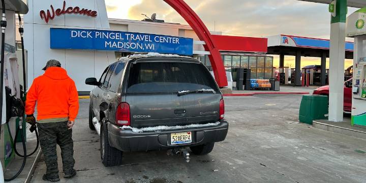 Travelers hit the road early while Madison locals stock up before snowfall