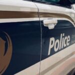 Man arrested after alerting Phoenix police to dead girlfriend in vehicle