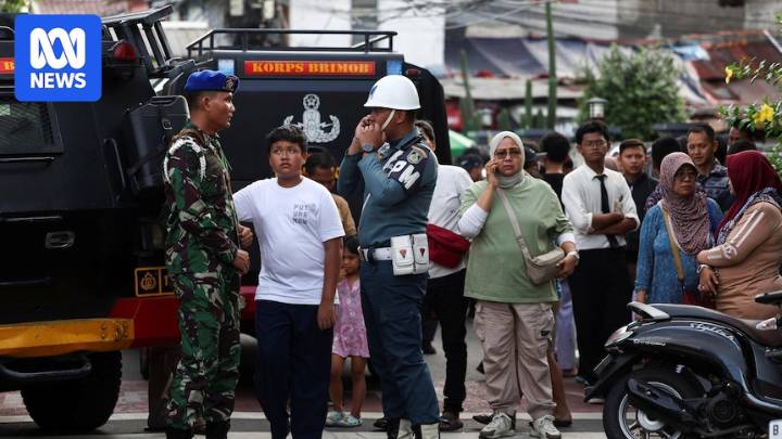 Blasts injure dozens at Indonesian mosque, student suspected