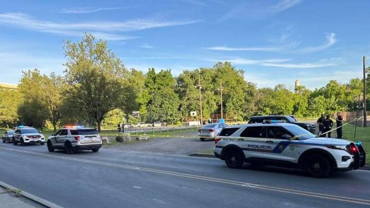 1 of 5 charged in basketball court slaying is sentenced to decades in prison