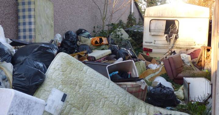 Piles of rubbish 'stuffed' by house leave neighbours miserable